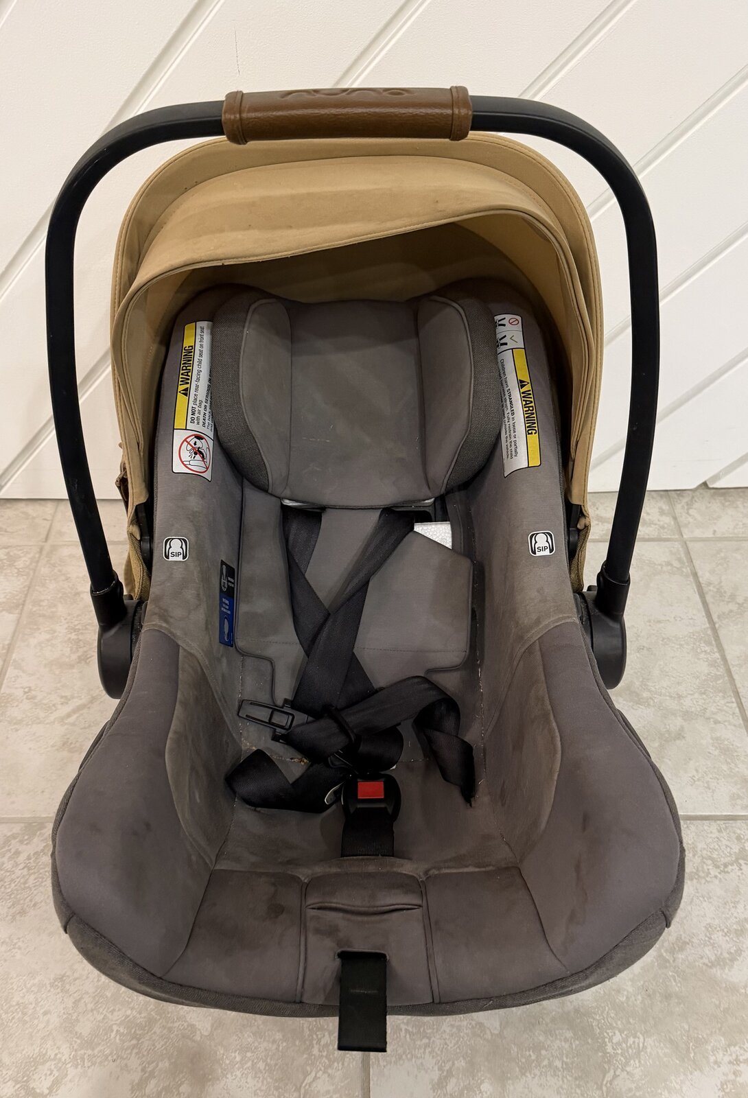 Car seat before deep cleaning by Suds and Seats Co